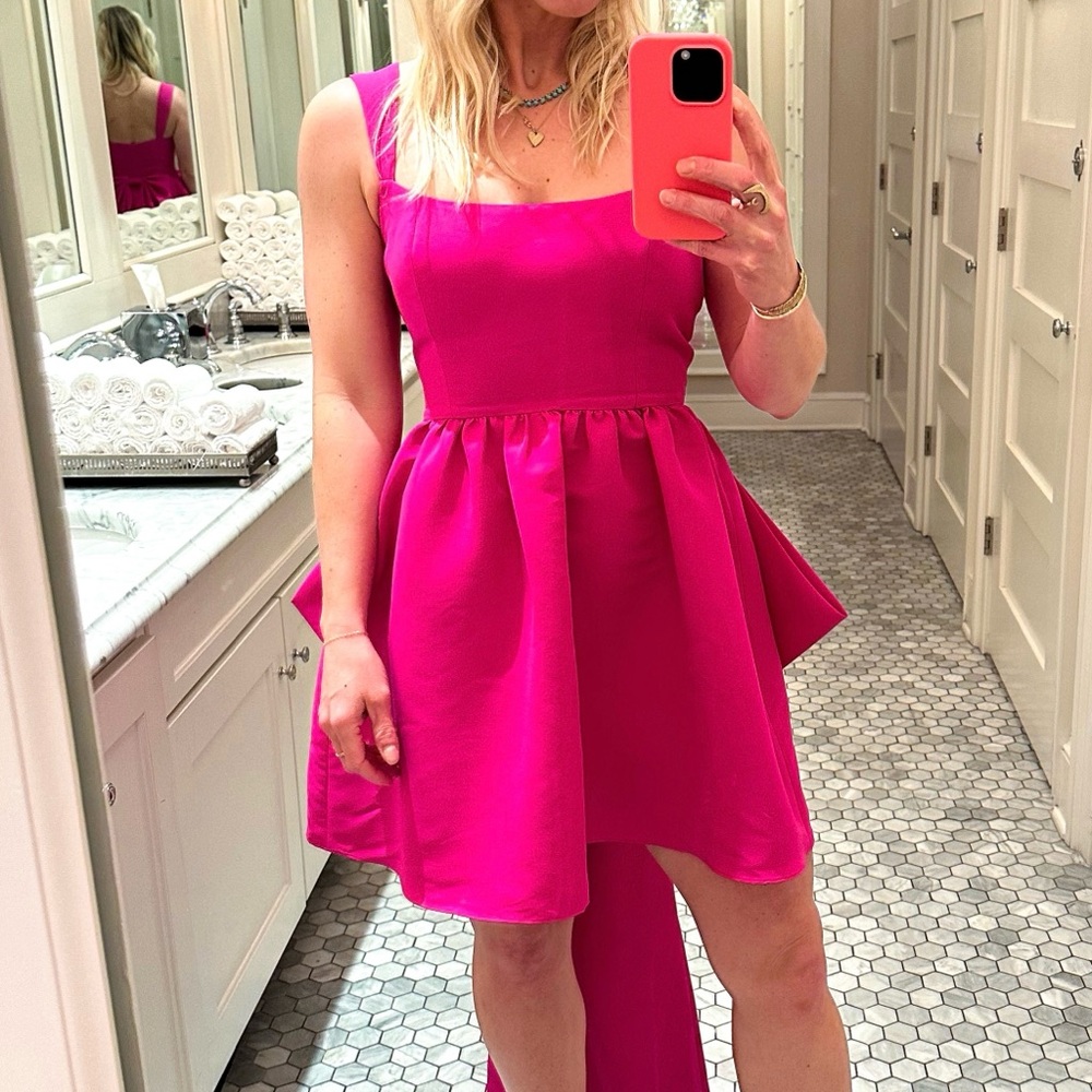 Vibrant Pink cocktail dress with statement bow on back